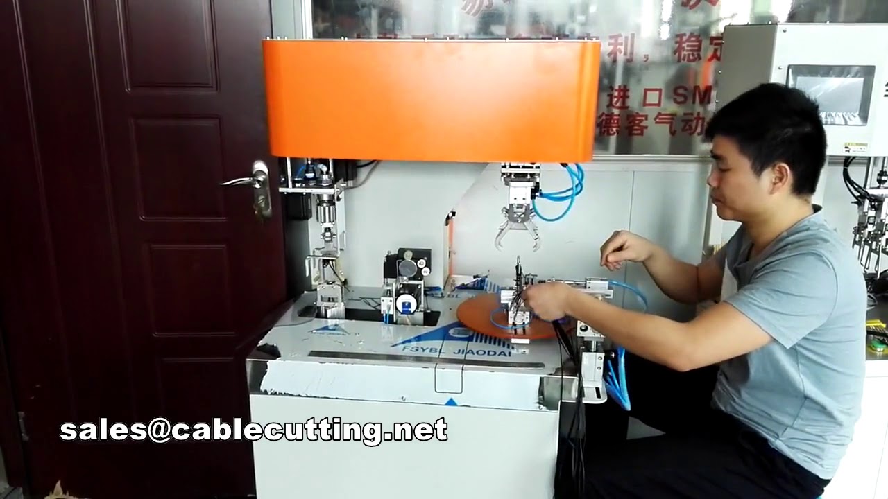 Machine à enrouler les écouteurs, forme Y